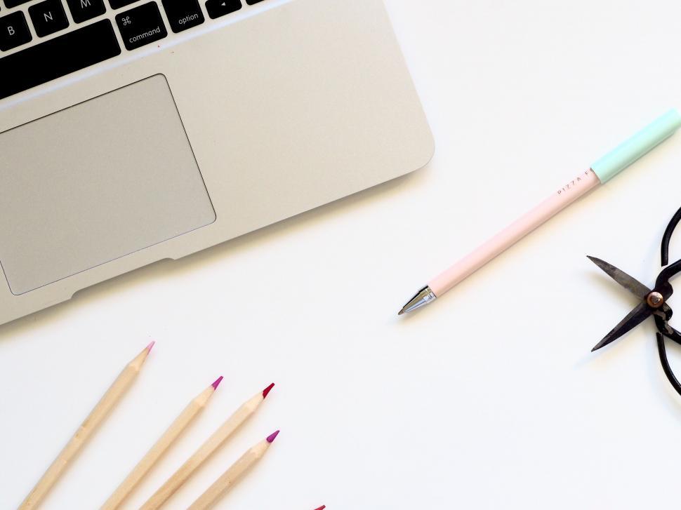 Free Image of Laptop and pencils on white background 