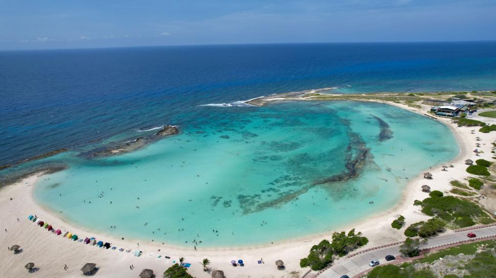 Free Image of Tropical beach with a stunning turquoise lagoon 