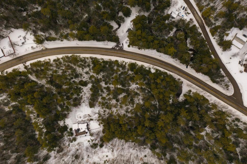 Free Image of Winter road through snowy landscape 