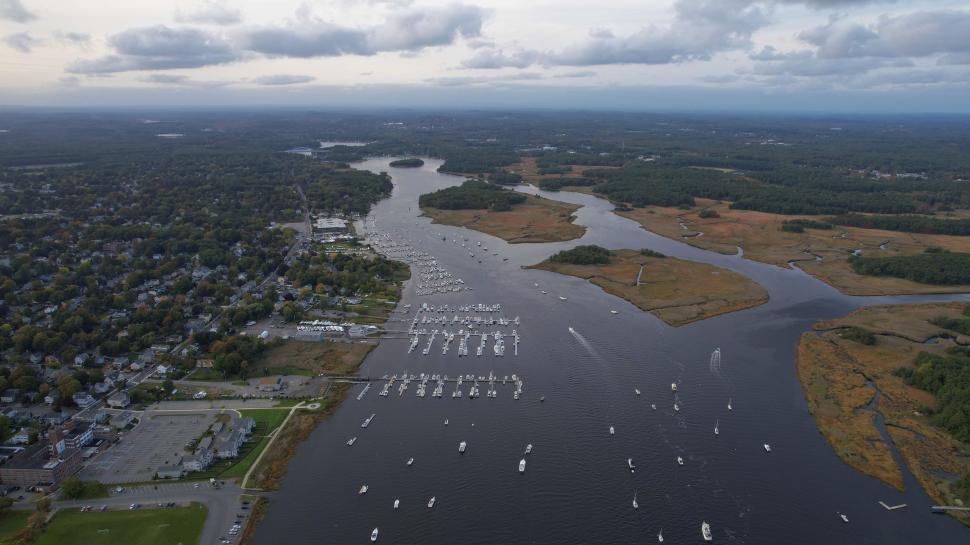 Free Image of Aerial view of a marina at dusk 