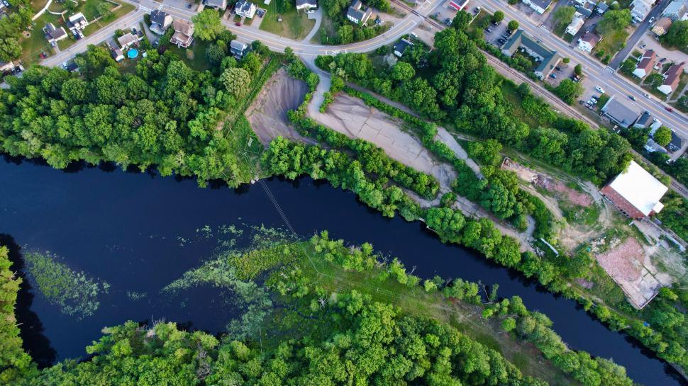 Free Image of Aerial view of a river with adjacent land 