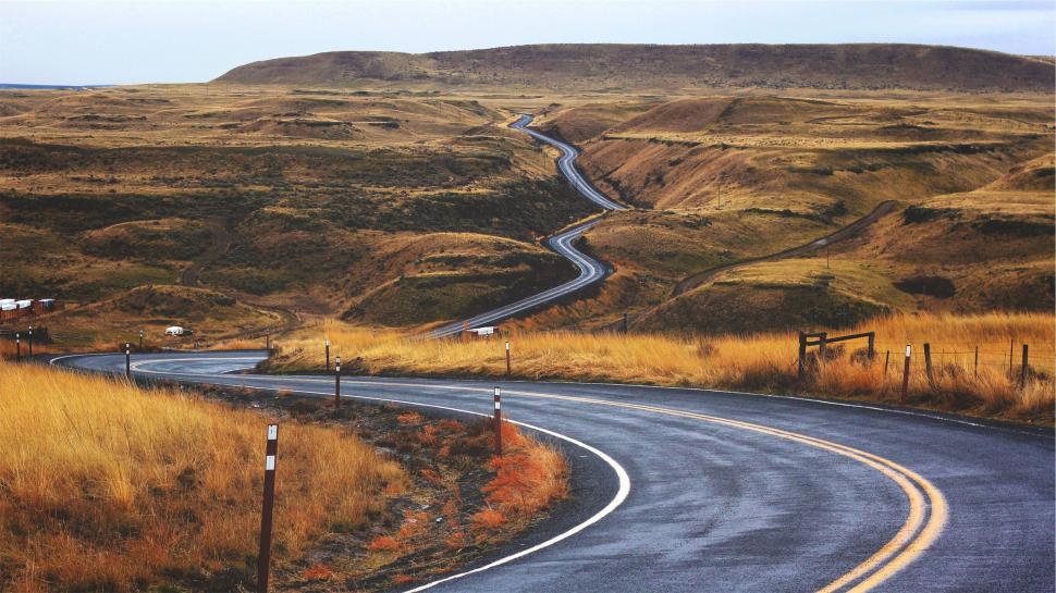Free Image of Curvy road through hilly countryside 