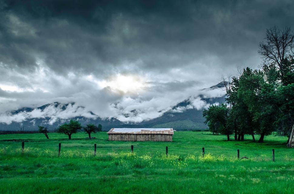 Free Image of Mountain landscape with a rustic barn 