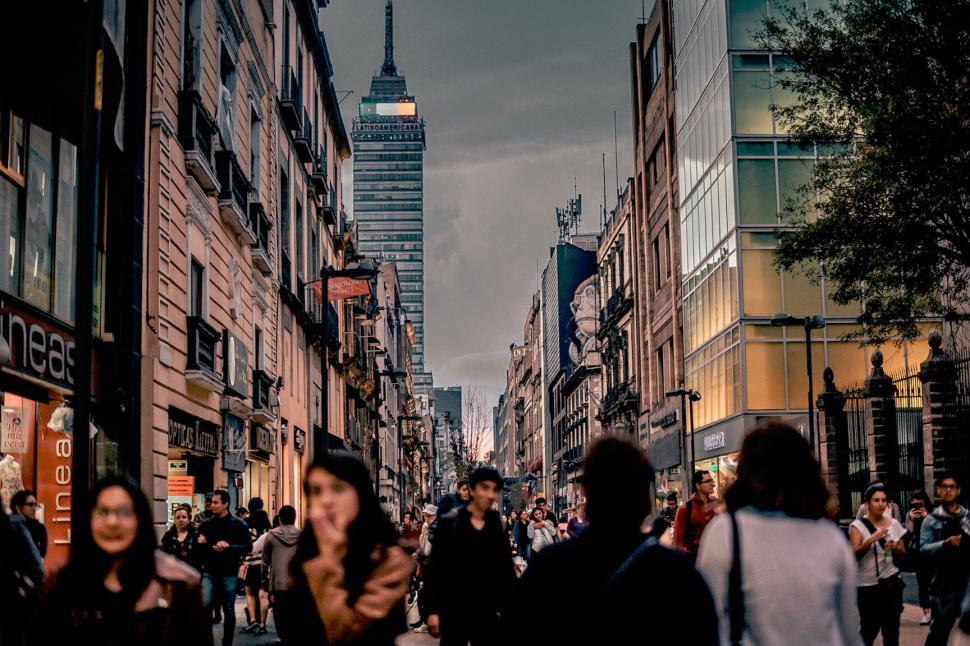 Free Image of Busy street view with historic tower 