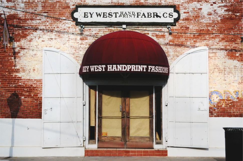 Free Image of Vintage store entrance with rustic sign 