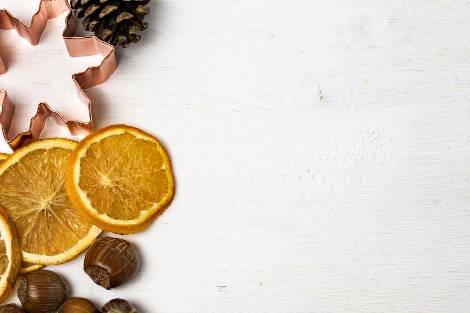 Free Image of Various holiday-themed items on a white wooden background 