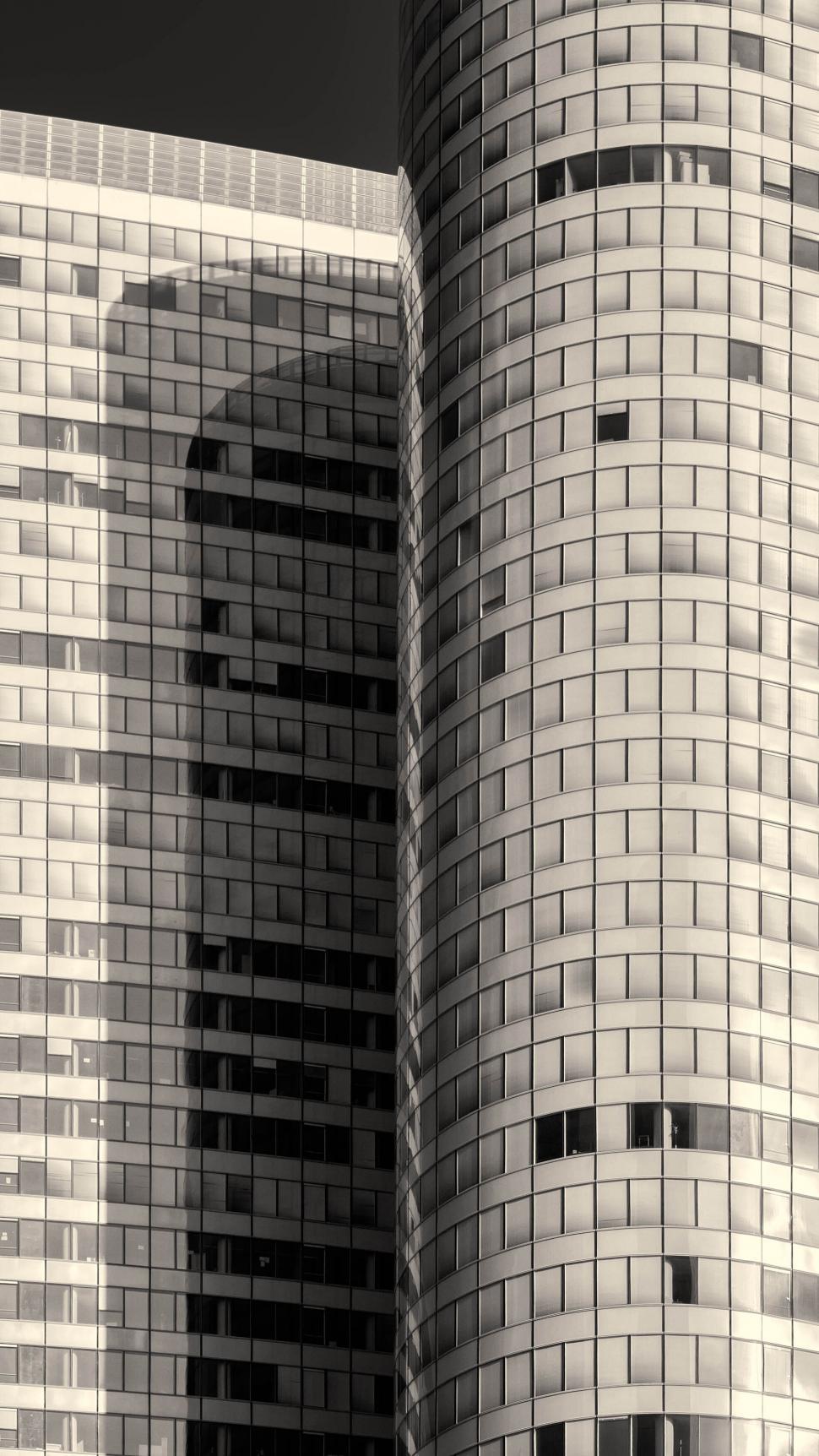 Free Image of Skyscrapers with reflective windows and geometric designs 