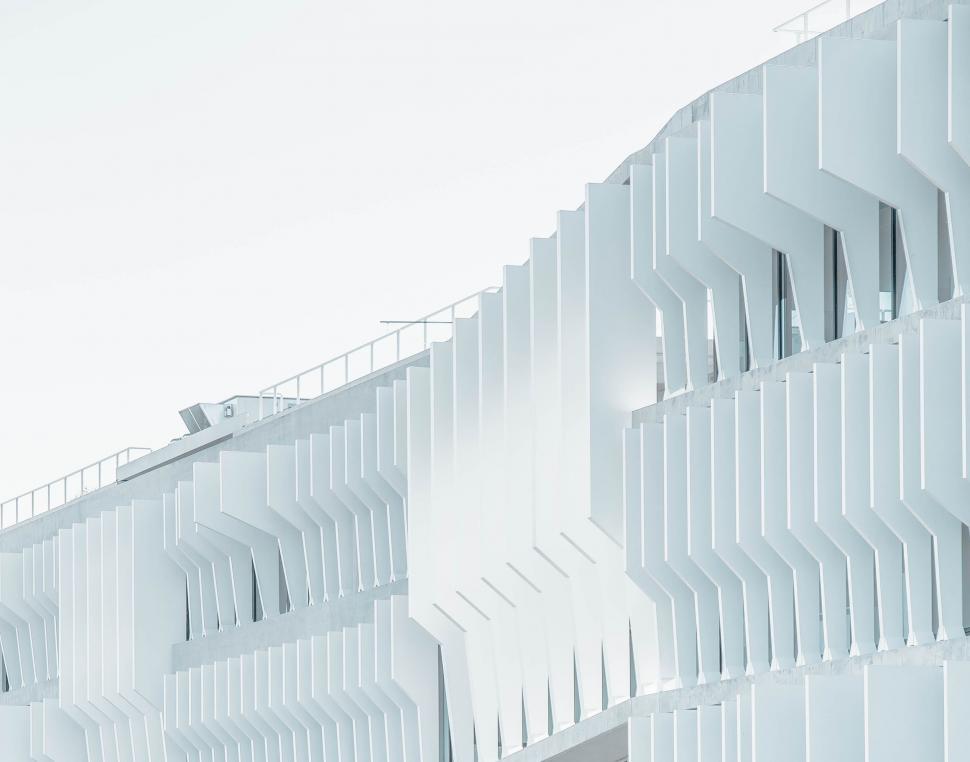 Free Image of Contemporary white facade with distinct rhythmic patterns 