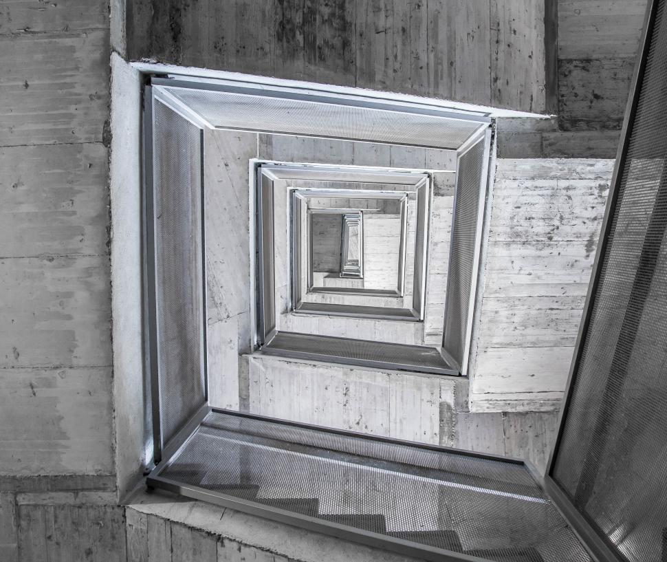 Free Image of Abstract angular stairway in concrete modern interior 