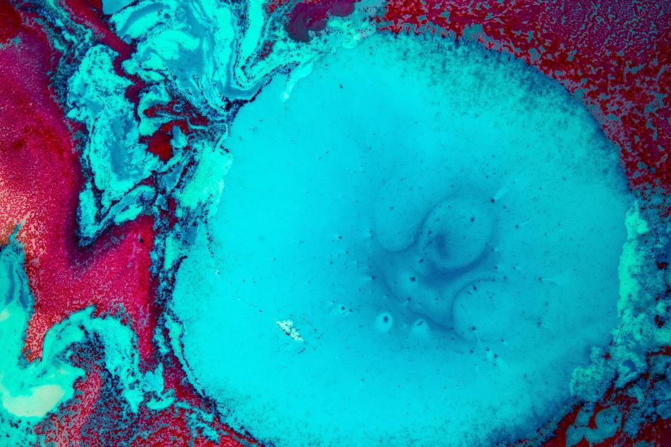 Free Image of Abstract fluid art with vibrant colors and swirling shapes 