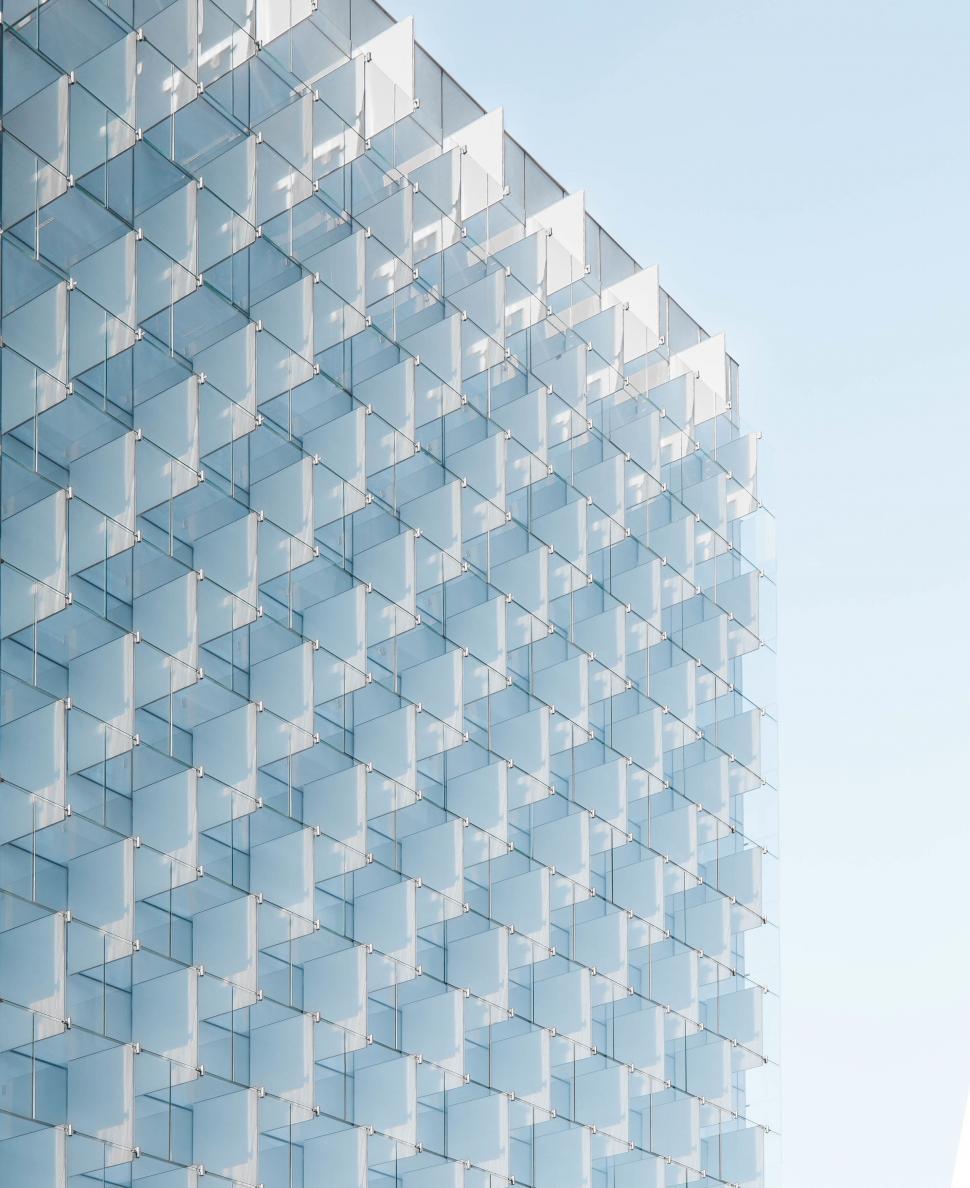 Free Image of Glass facade building with repetitive geometric patterns 