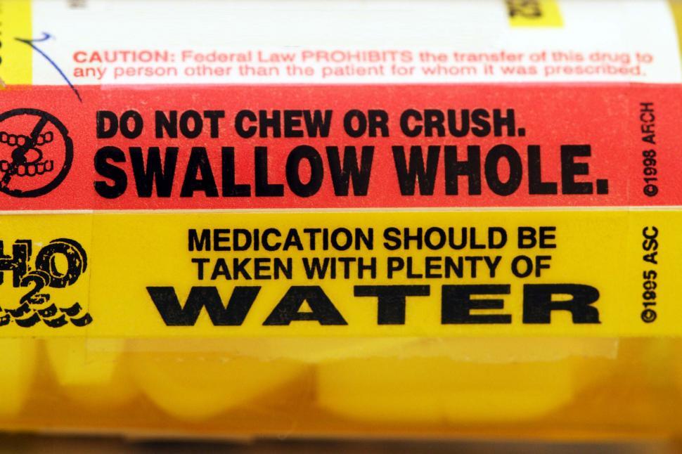 Free Image of Warnings on a pharmaceutical bottle 