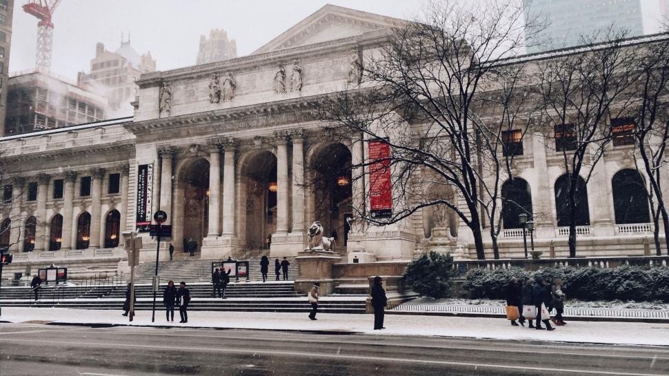 Free Image of Snowy day at grand architectural library with pillars 