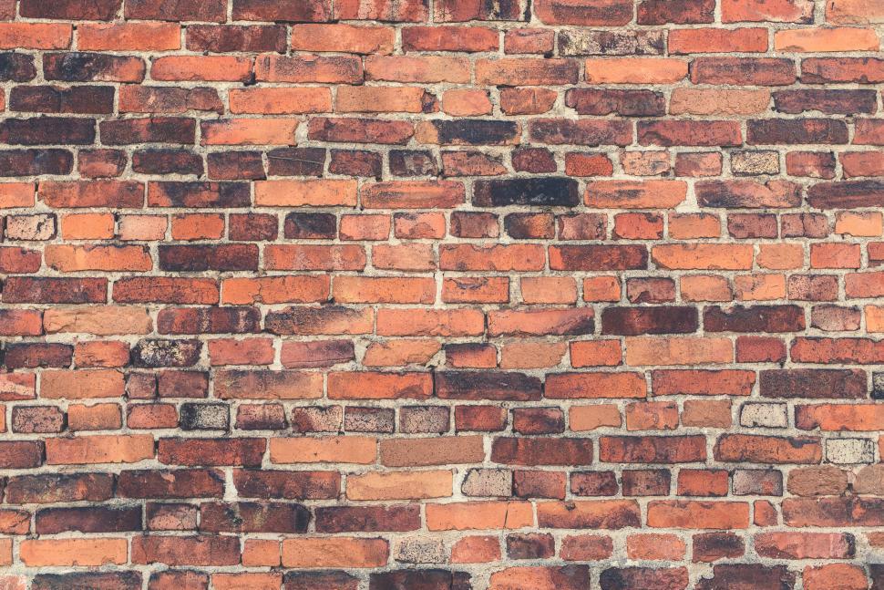 Free Image of Detailed and textured red brick wall as background image 