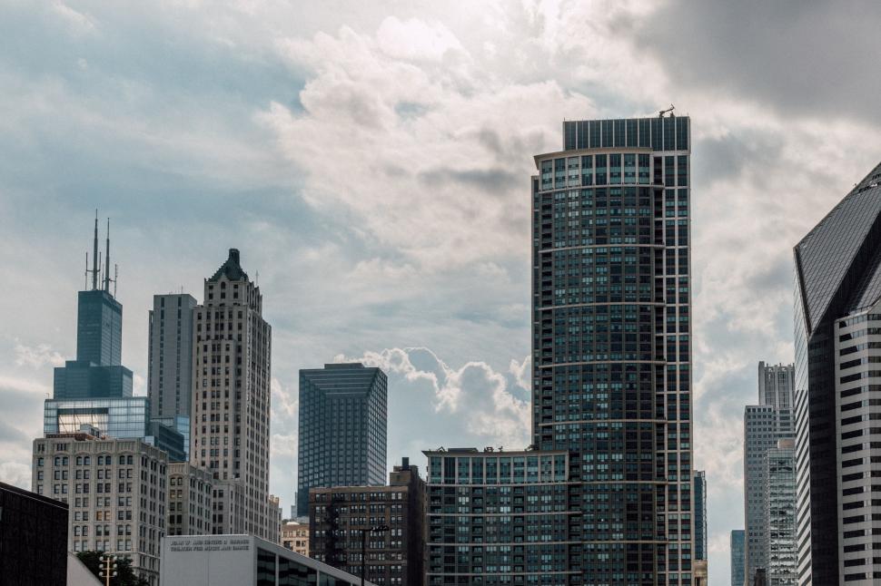 Free Image of City skyline with modern and historic tall buildings 
