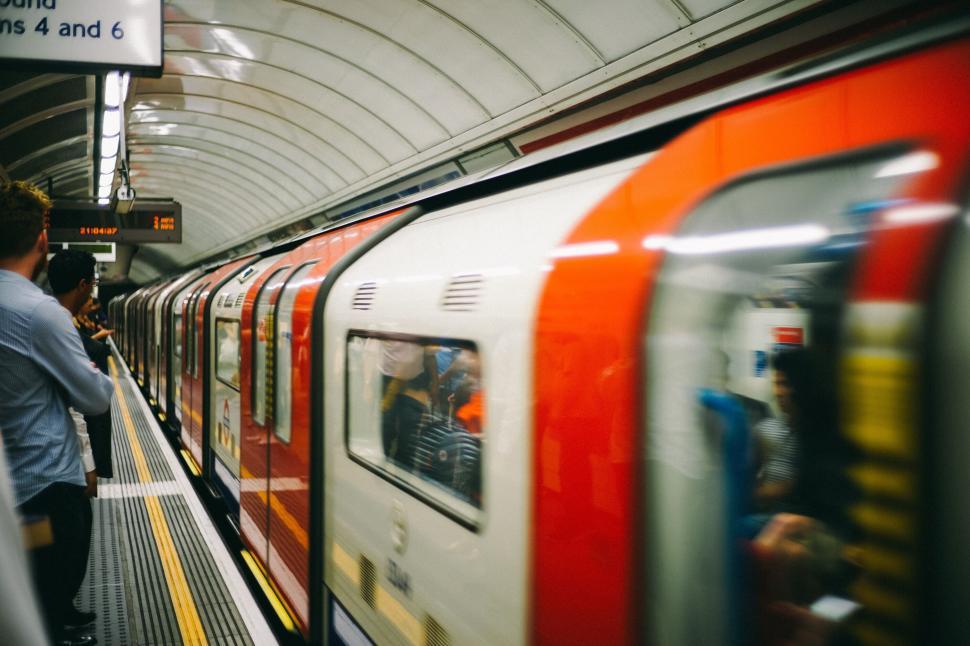 Free Image of Busy London underground train station with moving train 