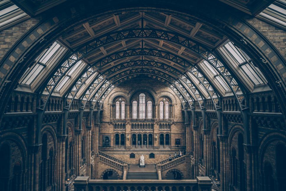 Free Image of Grand central hall of a historic building with intricate roof design. 