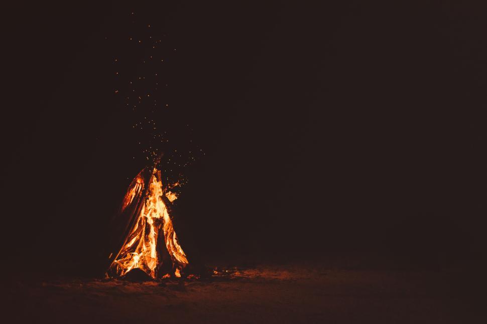 Free Image of An isolated bonfire exuding warmth and light in the darkness 