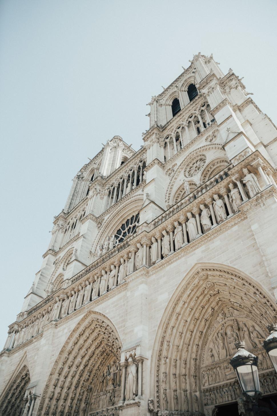 Free Image of Gothic architecture of the iconic Notre-Dame de Paris cathedral 