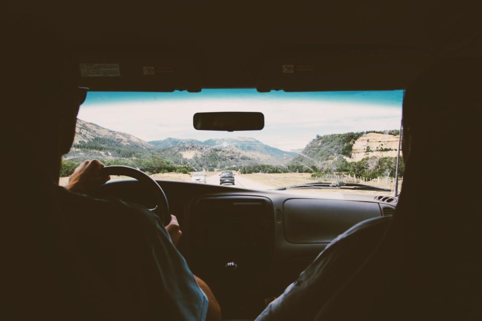 Free Image of Driving through mountain road with scenic views 