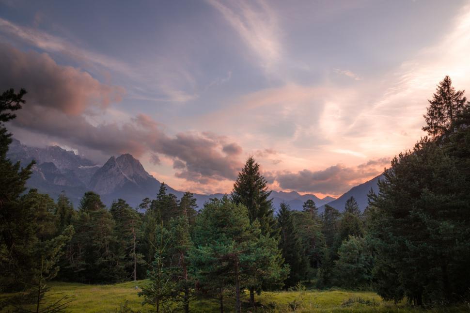 Free Image of Sunset over mountains and forest, peaceful and natural tranquility 