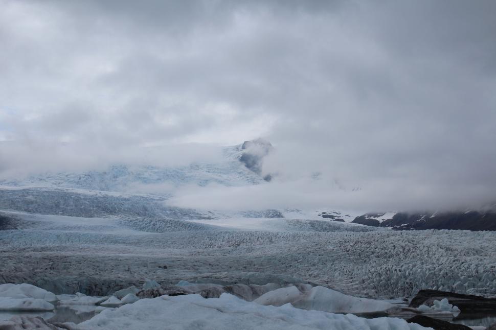 Free Image of Expansive glacier landscape under cloudy skies, isolated wilderness 