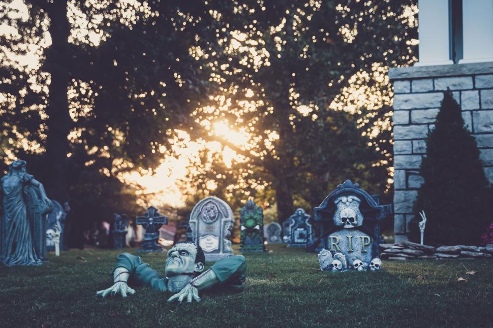 Free Image of Halloween decorations featuring gravestones in a spooky cemetery 
