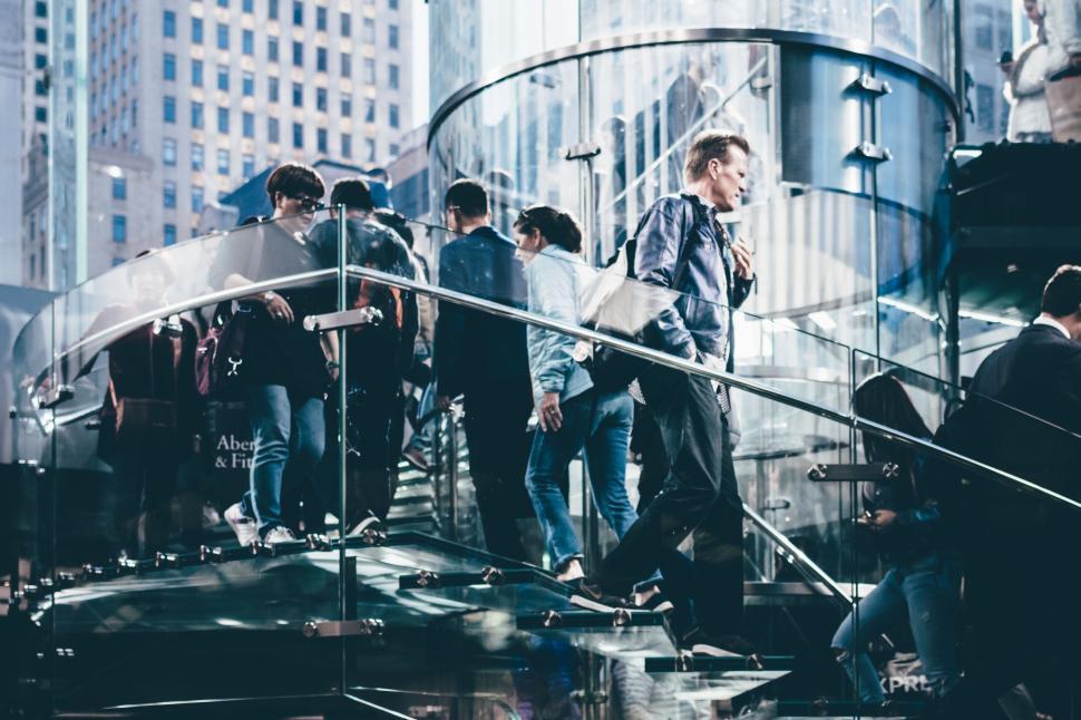 Free Image of Crowded urban staircase with reflective glass walls in daylight 