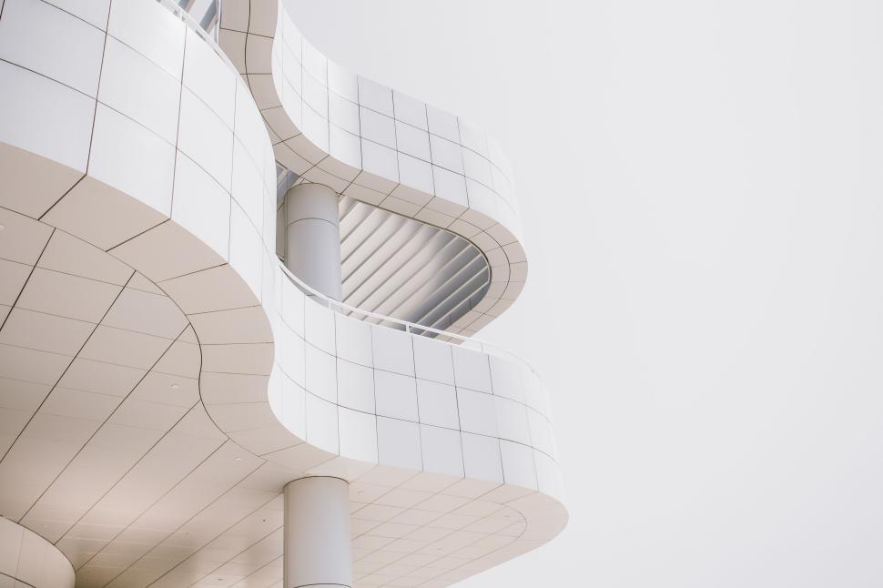 Free Image of Modern white building with curved lines and minimalist design. 