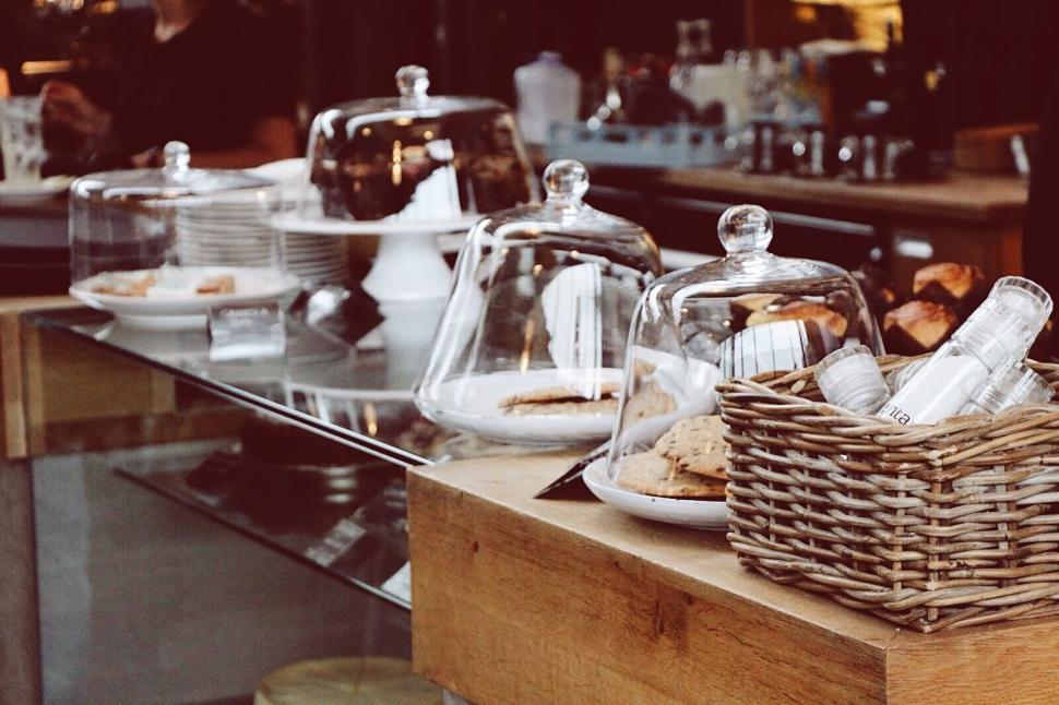 Free Image of Display of various pastries and cookies at a bakery counter. 