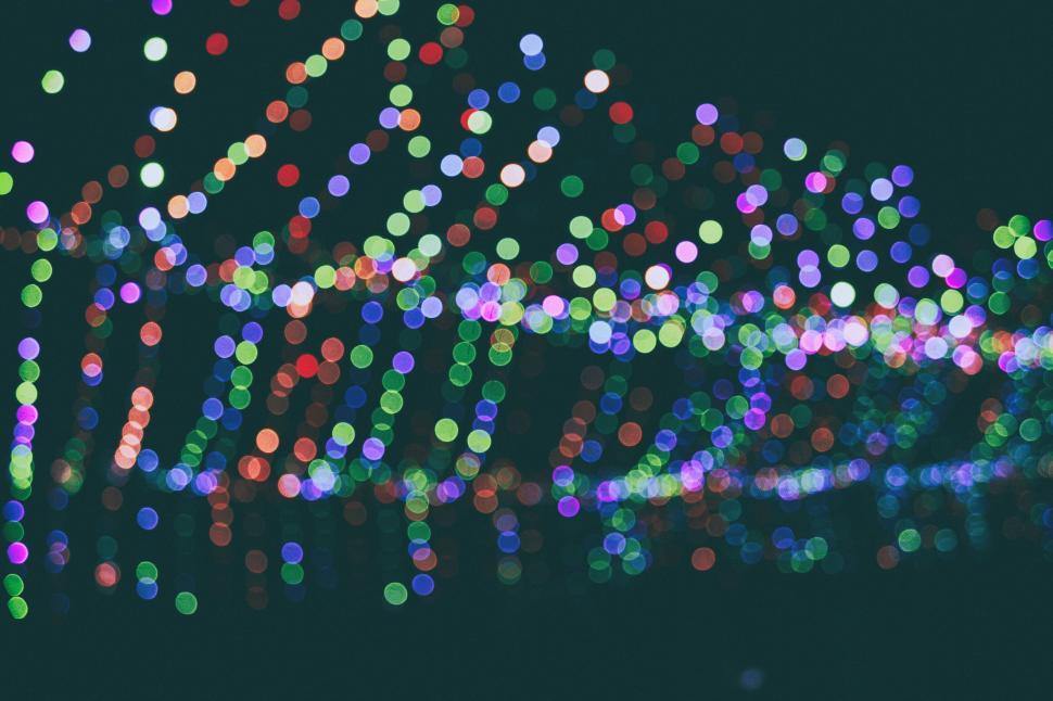 Free Image of Colorful bokeh lights creating an abstract, festive atmosphere 