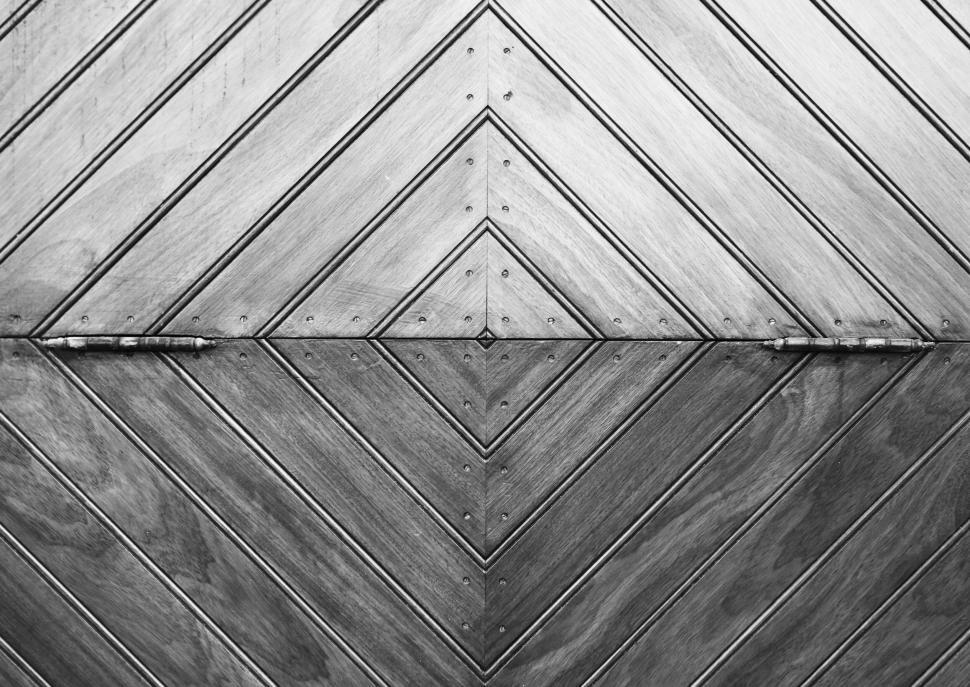 Free Image of Geometrically patterned wooden panels aligned in symmetrical design 