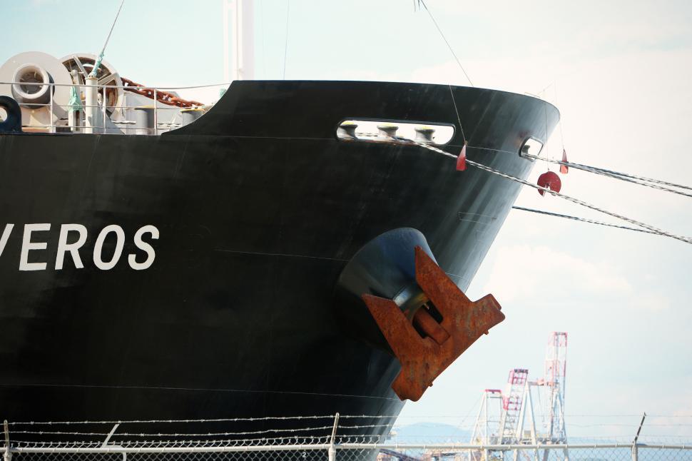 Free Image of Close-up of a large ship s bow with anchor at the dock 