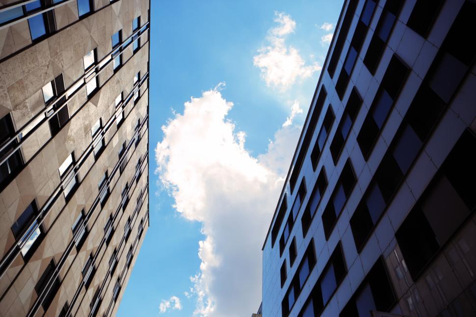 Free Image of Sky between modern skyscrapers on a bright, sunny day downtown. 