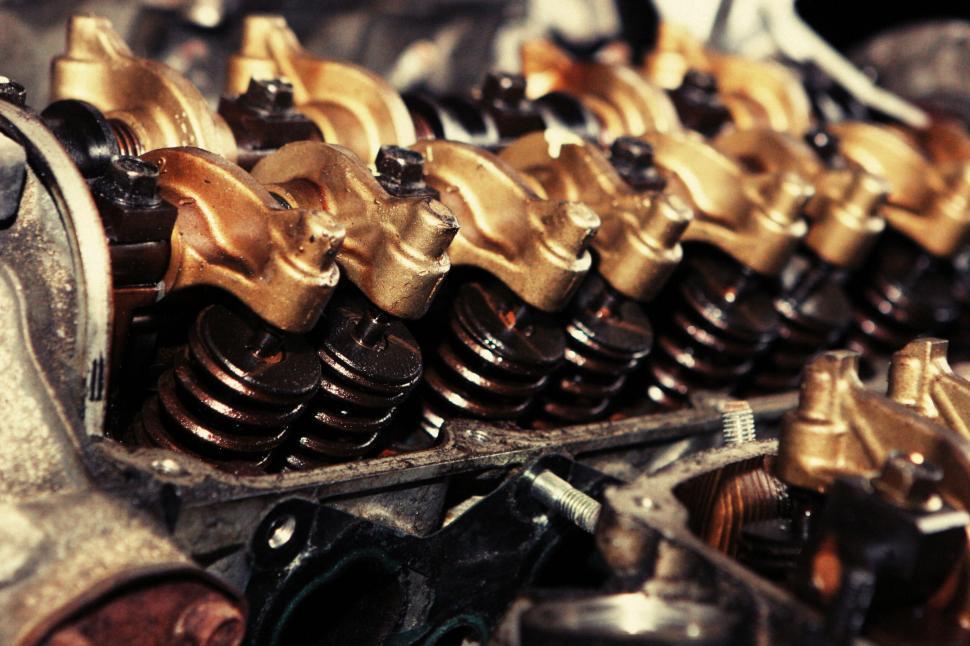 Free Image of Close-up of complex engine components showcasing mechanical intricacies 