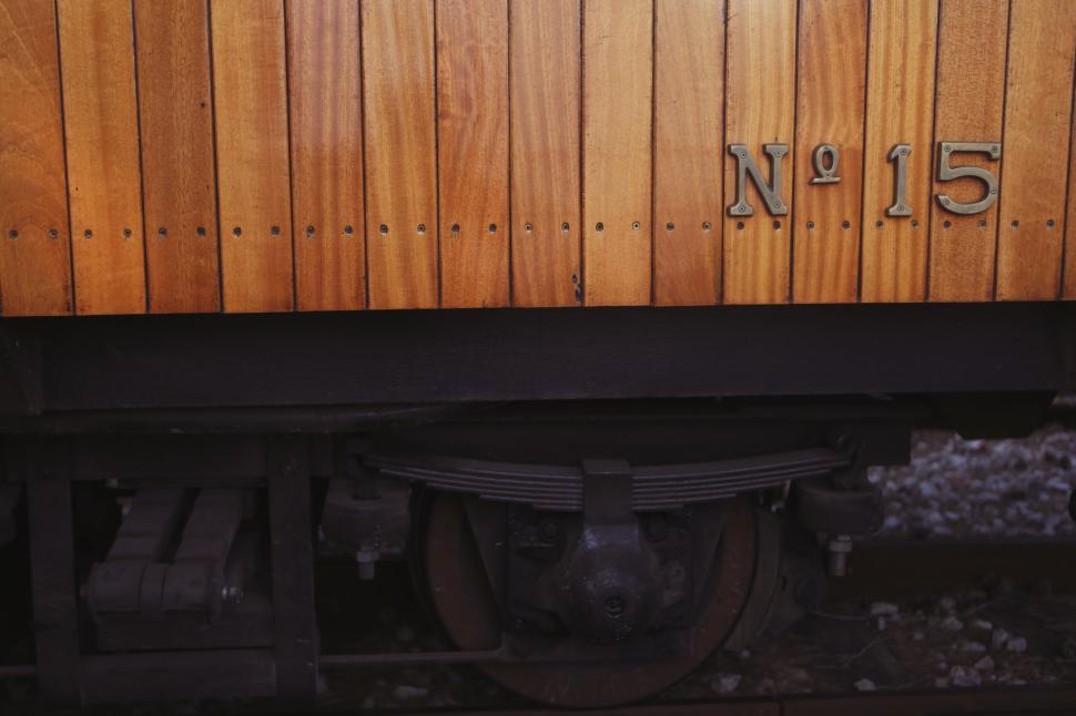 Free Image of Close-up of a vintage train car number 15 showcasing wooden panels 