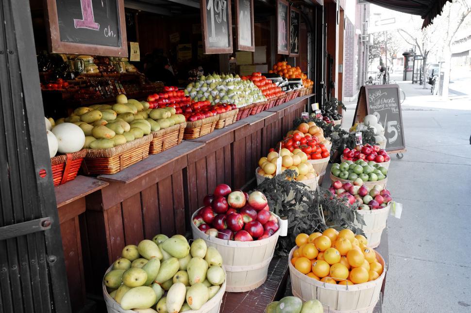 Free Image of Vibrant produce market with various fresh fruits and vegetables 