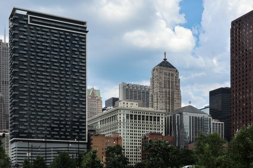 Free Image of Contrasting skyscrapers with historical building in the distance. 