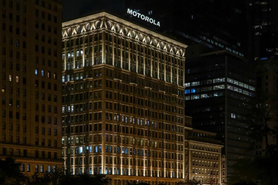 Free Image of Illuminated Motorola Building at Night with Stunning Architectural Details 