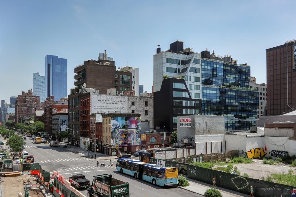 Free Image of Modern urban street intersected with art and architectural marvels. 