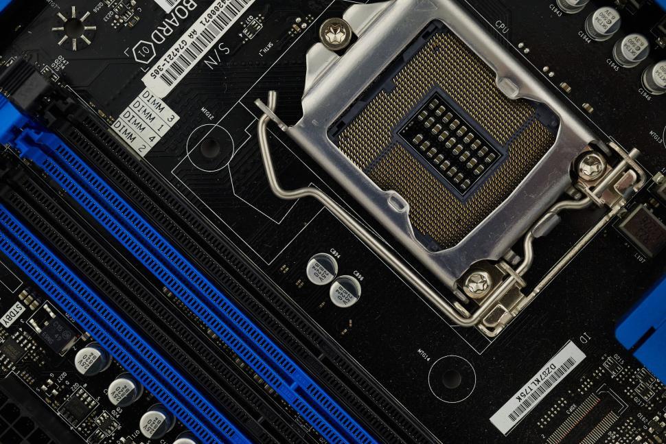 Free Image of Close-up view of computer motherboard socket showing intricate details 