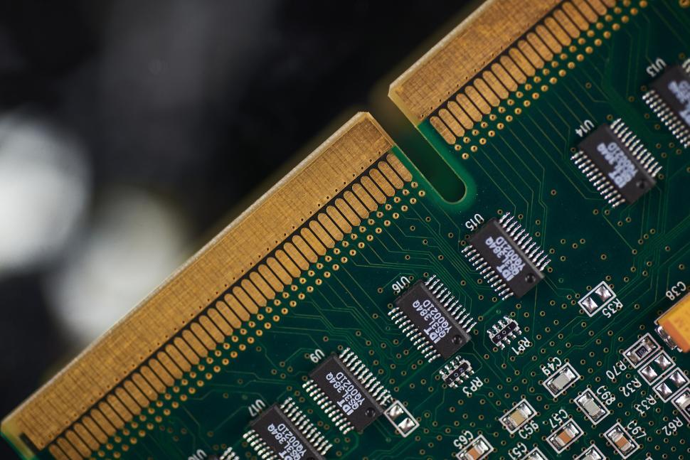 Free Image of Close-up of RAM module contacts with green circuit board details 