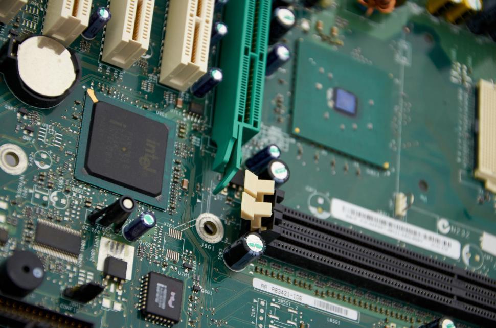 Free Image of Detailed view of computer motherboard with various components 