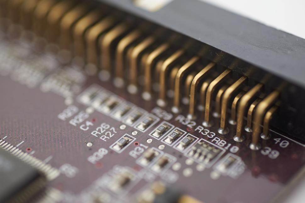 Free Image of Detailed view of circuit board pins and micro components assembly 