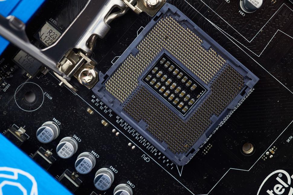 Free Image of Close-up shot of a server CPU or motherboard socket hardware. 