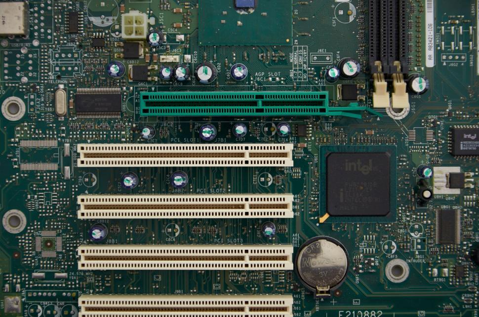Free Image of Detailed view of a computer motherboard with various components. 