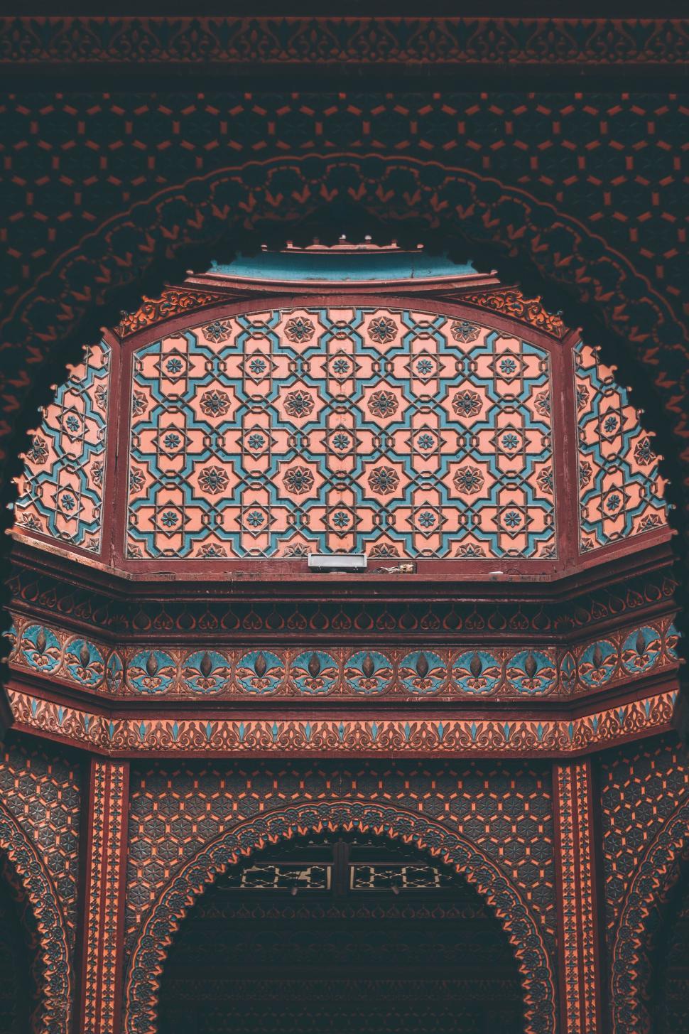 Free Image of Ornate architectural ceiling with intricate geometric red patterns 