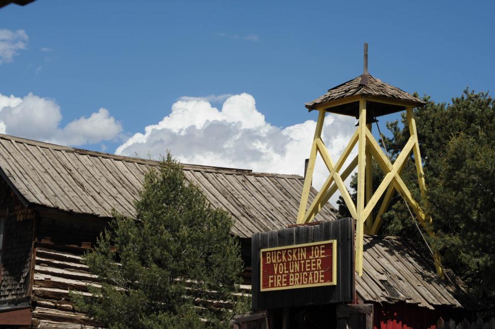Free Image of Wooden Firehouse and trees 
