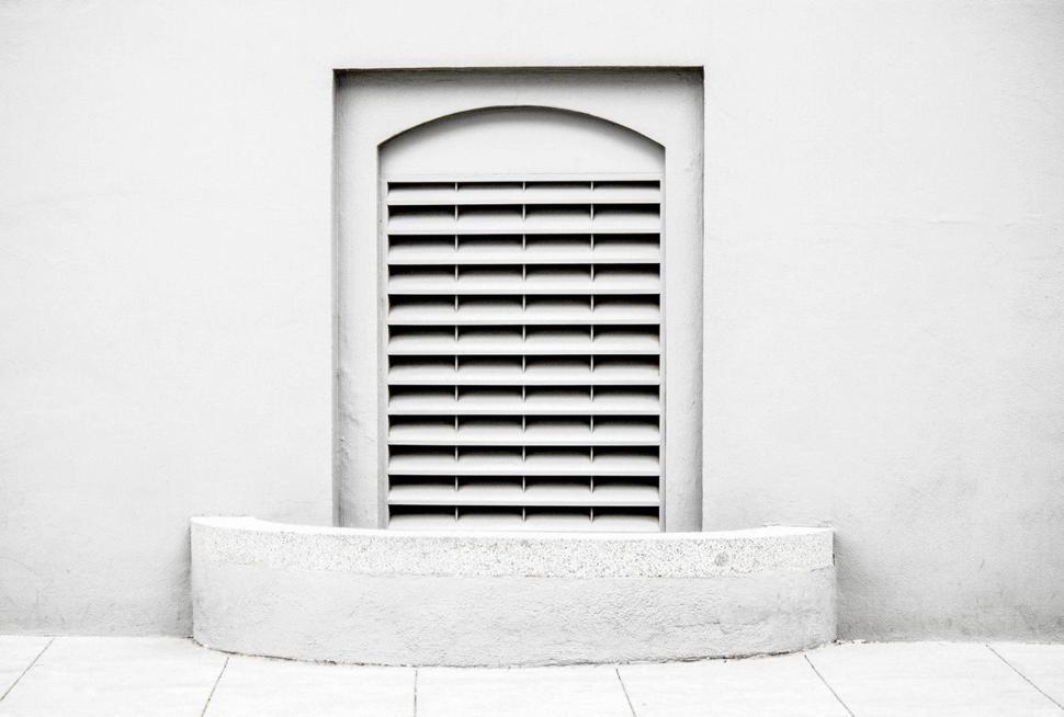 Free Image of Minimalist gray wall with a vent and clean lines in architecture 