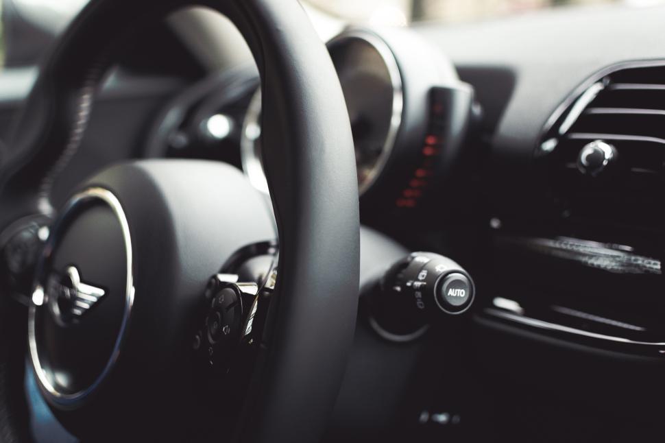 Free Image of Close-up of a car dashboard with sleek design and modern controls. 